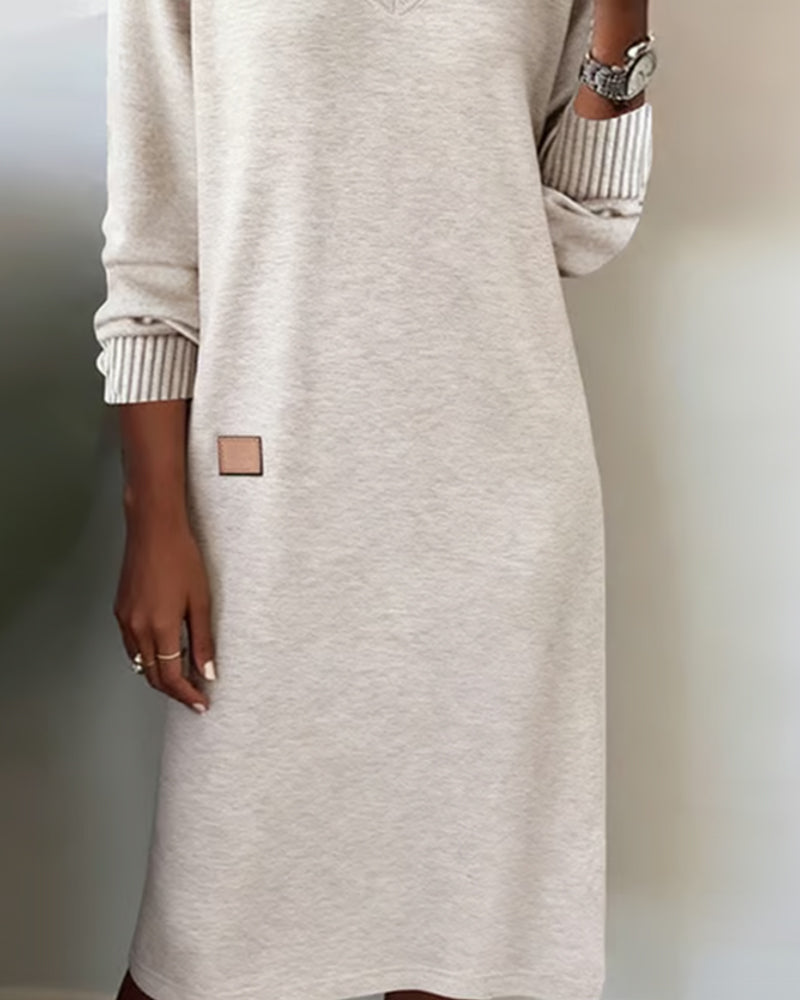 Elegante abito in maglia con scollo a V