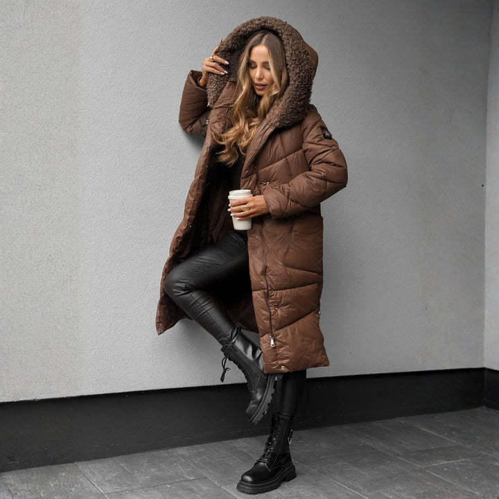 Eva | Piumino con cappuccio per un'eleganza invernale