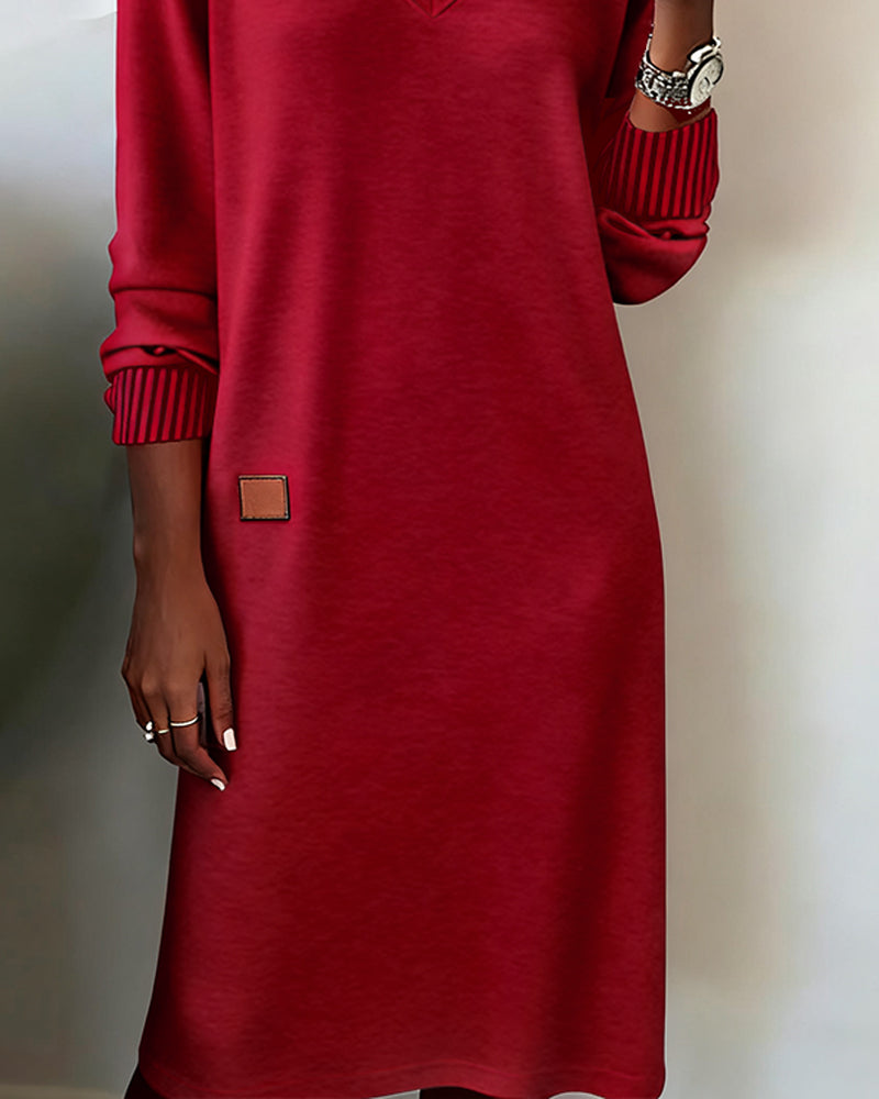 Elegante abito in maglia con scollo a V