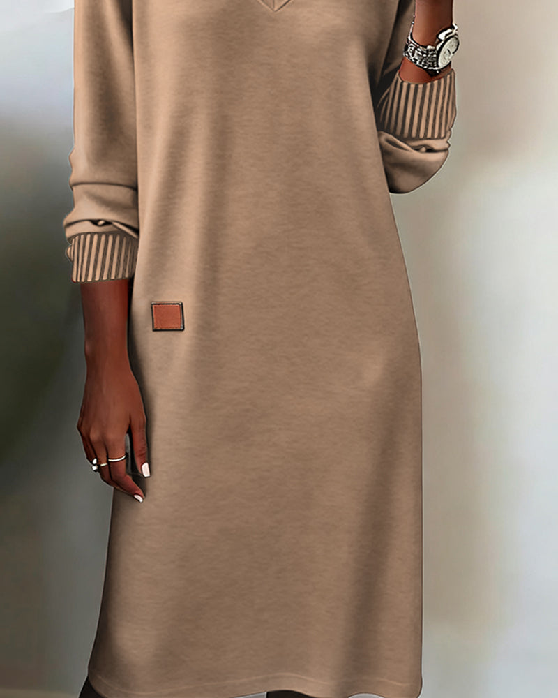 Elegante abito in maglia con scollo a V