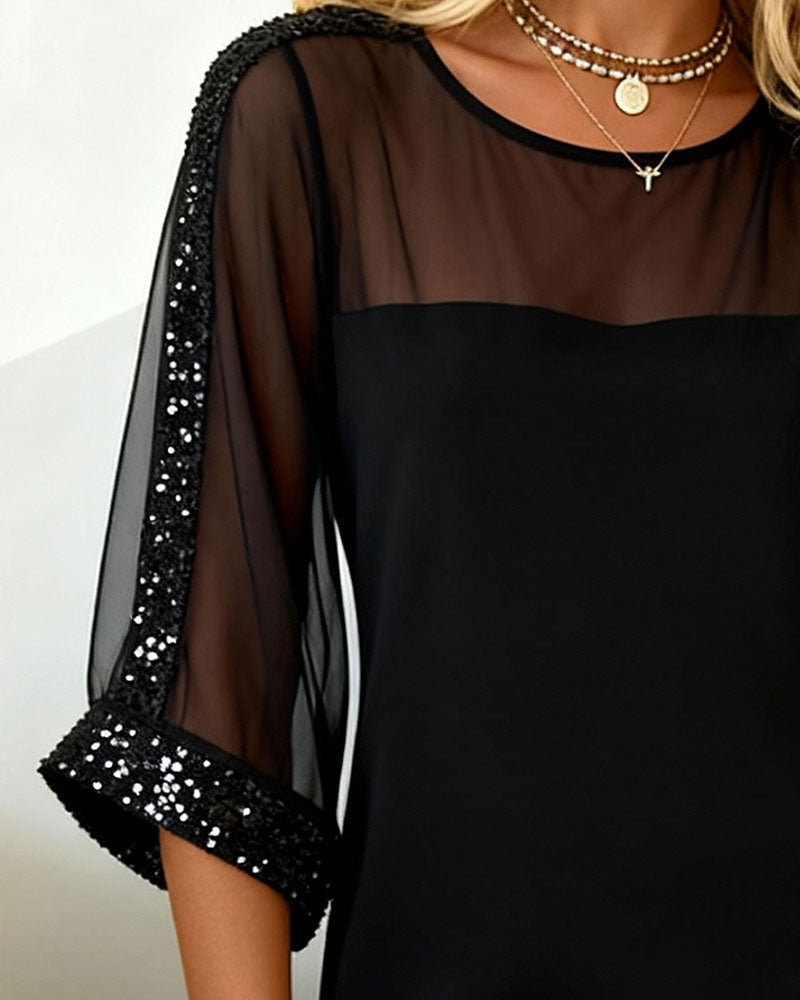 Abito con paillettes e inserti in mesh con scollo rotondo