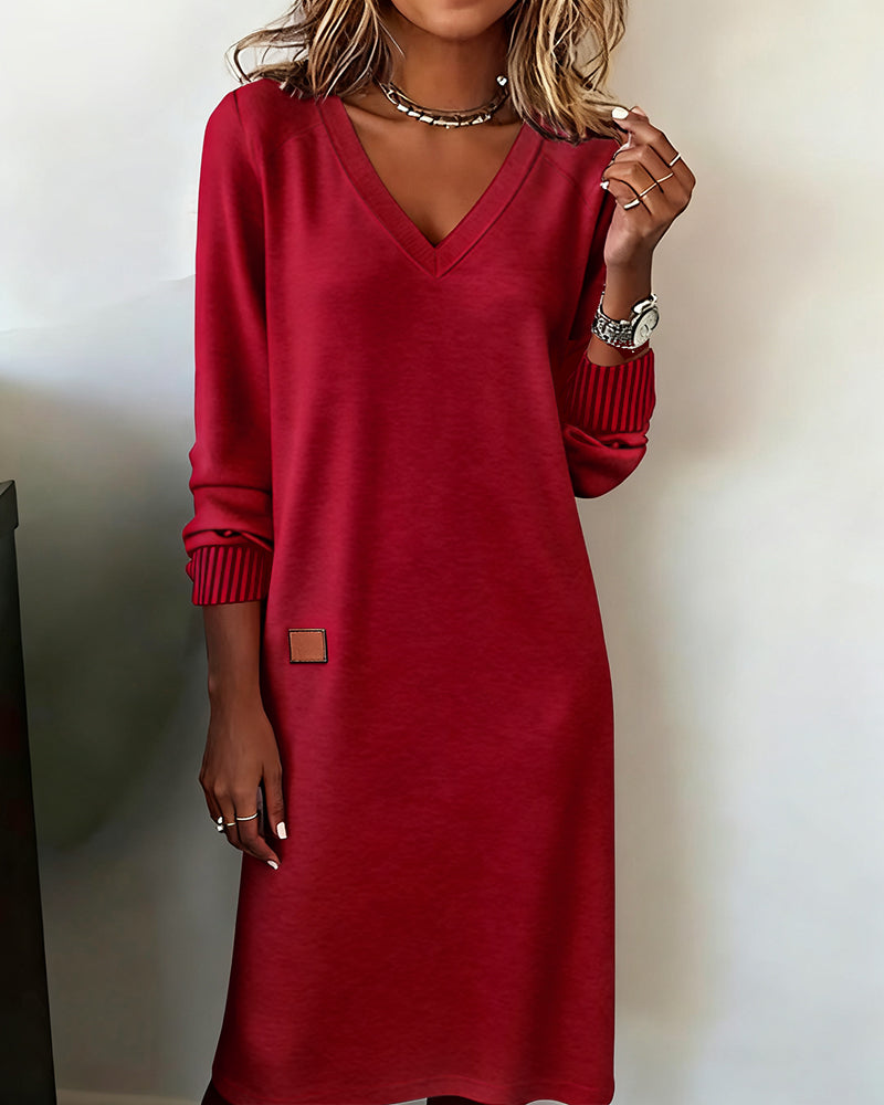 Elegante abito in maglia con scollo a V